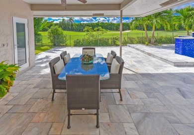 This elegantly remodeled contemporary pool home is located in on Boca Grove Golf and Tennis in Florida - for sale on GolfHomes.com, golf home, golf lot