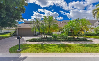 This elegantly remodeled contemporary pool home is located in on Boca Grove Golf and Tennis in Florida - for sale on GolfHomes.com, golf home, golf lot