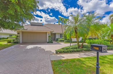 This elegantly remodeled contemporary pool home is located in on Boca Grove Golf and Tennis in Florida - for sale on GolfHomes.com, golf home, golf lot