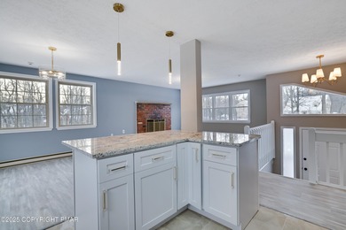 It's turnkey and ready for you to move in! Spacious, fully on Pocono Farms Country Club in Pennsylvania - for sale on GolfHomes.com, golf home, golf lot