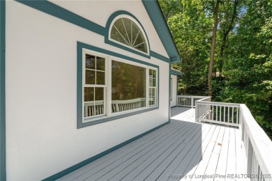 NEW LANDSCAPING AND NEW ROOF 2024! The perfect location! 15 The on Carolina Trace Country Club in North Carolina - for sale on GolfHomes.com, golf home, golf lot