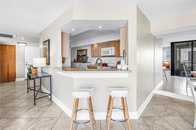 Top Floor condo with sweeping views of the Marina at Isla Del on Isla Del Sol Yacht and Country Club in Florida - for sale on GolfHomes.com, golf home, golf lot