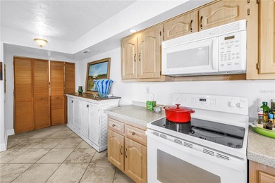 Top Floor condo with sweeping views of the Marina at Isla Del on Isla Del Sol Yacht and Country Club in Florida - for sale on GolfHomes.com, golf home, golf lot