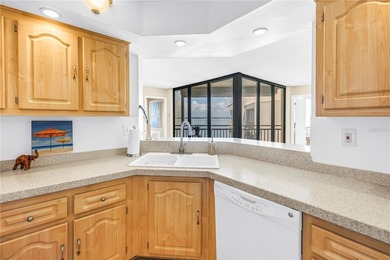 Top Floor condo with sweeping views of the Marina at Isla Del on Isla Del Sol Yacht and Country Club in Florida - for sale on GolfHomes.com, golf home, golf lot