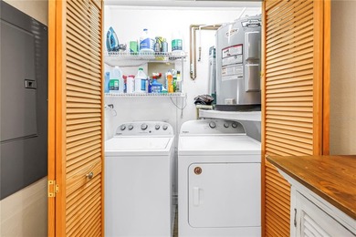 Top Floor condo with sweeping views of the Marina at Isla Del on Isla Del Sol Yacht and Country Club in Florida - for sale on GolfHomes.com, golf home, golf lot