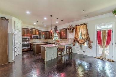 Welcome to 1405 Rainey Way - A Cul-de-Sac Gem in Crystal Lake on Crystal Lake Golf and Country Club in Georgia - for sale on GolfHomes.com, golf home, golf lot