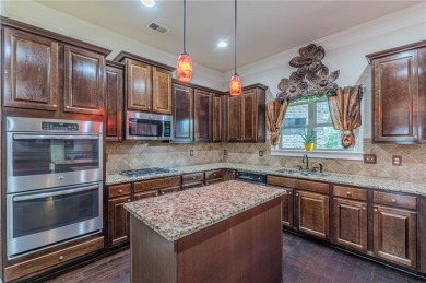 Welcome to 1405 Rainey Way - A Cul-de-Sac Gem in Crystal Lake on Crystal Lake Golf and Country Club in Georgia - for sale on GolfHomes.com, golf home, golf lot