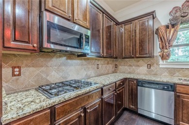 Welcome to 1405 Rainey Way - A Cul-de-Sac Gem in Crystal Lake on Crystal Lake Golf and Country Club in Georgia - for sale on GolfHomes.com, golf home, golf lot