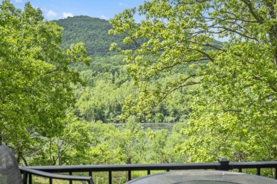 Nestled in a tranquil, gated community with views of the on Pointe Royale Village Country Club in Missouri - for sale on GolfHomes.com, golf home, golf lot