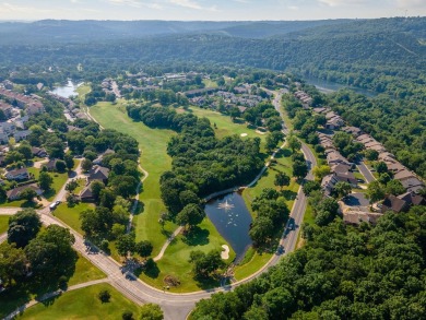 Nestled in a tranquil, gated community with views of the on Pointe Royale Village Country Club in Missouri - for sale on GolfHomes.com, golf home, golf lot