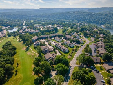 Nestled in a tranquil, gated community with views of the on Pointe Royale Village Country Club in Missouri - for sale on GolfHomes.com, golf home, golf lot
