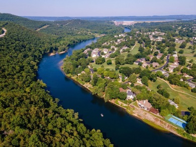 Nestled in a tranquil, gated community with views of the on Pointe Royale Village Country Club in Missouri - for sale on GolfHomes.com, golf home, golf lot
