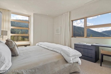 Offered fully turnkey, this stunning mountain contemporary home on Snake River Sporting Club in Wyoming - for sale on GolfHomes.com, golf home, golf lot