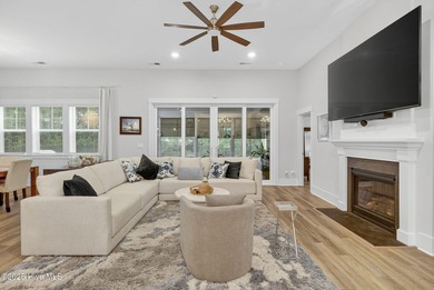 Move-in ready and meticulously maintained, this beautiful home on Cape Fear National At Brunswick Forest in North Carolina - for sale on GolfHomes.com, golf home, golf lot