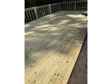 Recently renovated ranch home with, new deck and newer roof is on Honey Creek Country Club in Georgia - for sale on GolfHomes.com, golf home, golf lot