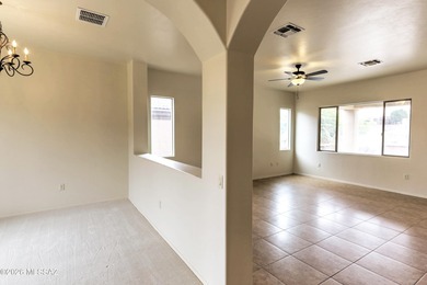 Located in the scenic Canoa Hills of Green Valley, this gated on Canoa Ranch Golf Club in Arizona - for sale on GolfHomes.com, golf home, golf lot