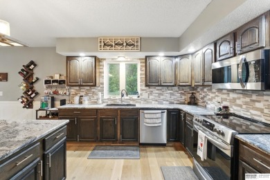 Ashley Danielsen, M: , ashleydanielsen,   - Nestled on the tee on Shadow Valley Golf Course in Iowa - for sale on GolfHomes.com, golf home, golf lot