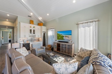 Welcome to your dream coastal retreat at 108 Magnolia Ave on the on Key Royale Club in Florida - for sale on GolfHomes.com, golf home, golf lot