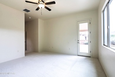 Located in the scenic Canoa Hills of Green Valley, this gated on Canoa Ranch Golf Club in Arizona - for sale on GolfHomes.com, golf home, golf lot