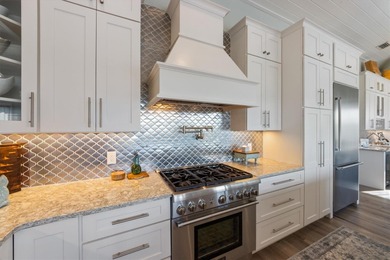 Welcome to your dream coastal retreat at 108 Magnolia Ave on the on Key Royale Club in Florida - for sale on GolfHomes.com, golf home, golf lot