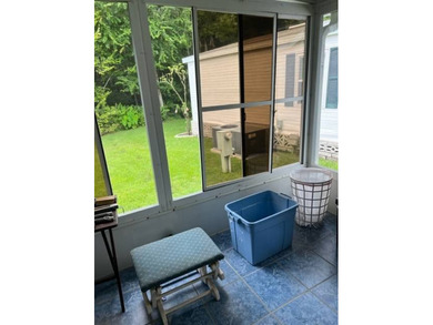 Welcome to your adorable getaway home in The Hamptons Golf and on Hamptons Golf Club in Florida - for sale on GolfHomes.com, golf home, golf lot