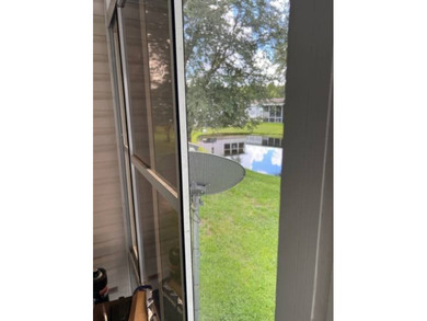 Welcome to your adorable getaway home in The Hamptons Golf and on Hamptons Golf Club in Florida - for sale on GolfHomes.com, golf home, golf lot