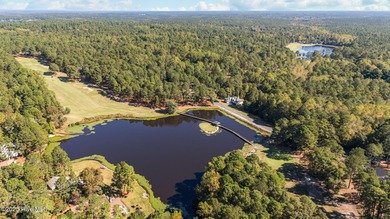 This golf front oasis is located on the picturesque 12th hole of on Seven Lakes Country Club in North Carolina - for sale on GolfHomes.com, golf home, golf lot