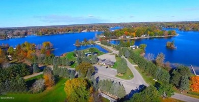 Beautiful WATERFRONT building site situated in a peaceful on Canadian Lakes Country Club-The Royal Course in Michigan - for sale on GolfHomes.com, golf home, golf lot