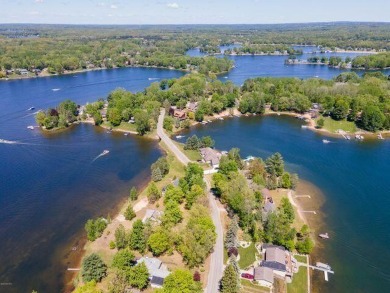 Beautiful WATERFRONT building site situated in a peaceful on Canadian Lakes Country Club-The Royal Course in Michigan - for sale on GolfHomes.com, golf home, golf lot