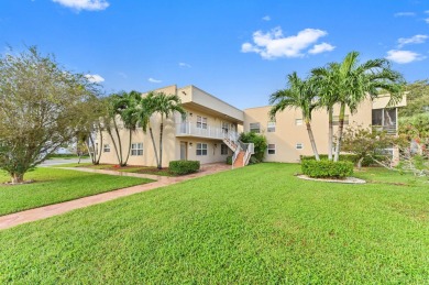 A/C 2021 Enjoy every day in this 2nd-floor condo in Kings Point on Kings Point Golf -Flanders Way in Florida - for sale on GolfHomes.com, golf home, golf lot