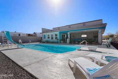 Tremendous opportunity in a terrific neighborhood! This unique on London Bridge Golf Course in Arizona - for sale on GolfHomes.com, golf home, golf lot