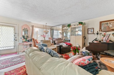 A/C 2021 Enjoy every day in this 2nd-floor condo in Kings Point on Kings Point Golf -Flanders Way in Florida - for sale on GolfHomes.com, golf home, golf lot