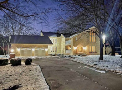 Nestled on a sprawling 1.5-acre premium lot, this exceptional on Pine Hills Golf Club in Illinois - for sale on GolfHomes.com, golf home, golf lot