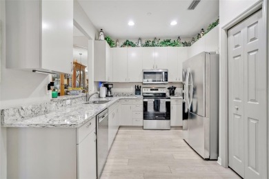 BEAUTIFUL, 3BD/2BA, END UNIT VILLA in The Links at Pelican on Pelican Pointe Golf and Country Club in Florida - for sale on GolfHomes.com, golf home, golf lot