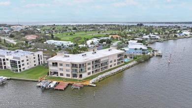 STUNNING DIRECT RIVERFRONT VIEWS of the Banana River and the on Cocoa Beach Country Club in Florida - for sale on GolfHomes.com, golf home, golf lot