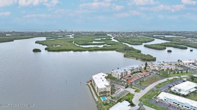 STUNNING DIRECT RIVERFRONT VIEWS of the Banana River and the on Cocoa Beach Country Club in Florida - for sale on GolfHomes.com, golf home, golf lot