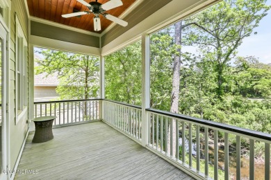 Located in The Arboretum in the coveted enclave of Caswell Beach on Oak Island Golf Club in North Carolina - for sale on GolfHomes.com, golf home, golf lot