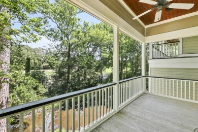 Located in The Arboretum in the coveted enclave of Caswell Beach on Oak Island Golf Club in North Carolina - for sale on GolfHomes.com, golf home, golf lot