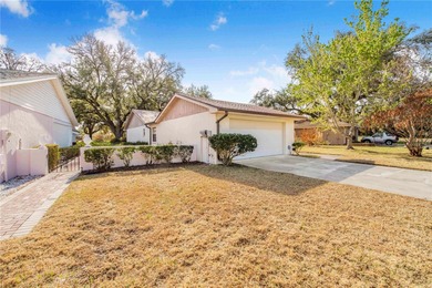 Welcome to this beautifully maintained patio home located in a on Cypresswood Golf and Country Club in Florida - for sale on GolfHomes.com, golf home, golf lot