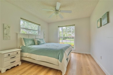 Ready to swap high-maintenance for high-enjoyment? This on The Dunedin Country Club in Florida - for sale on GolfHomes.com, golf home, golf lot