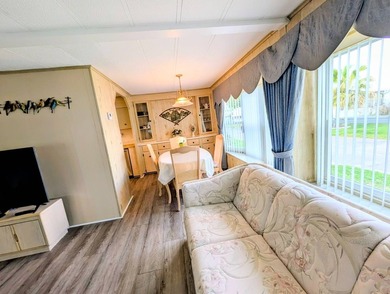 Move-in ready and fully furnished, this beautifully maintained on Grasslands Golf and Country Club in Florida - for sale on GolfHomes.com, golf home, golf lot