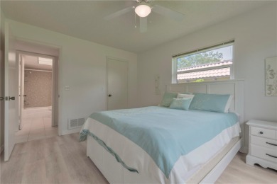Ready to swap high-maintenance for high-enjoyment? This on The Dunedin Country Club in Florida - for sale on GolfHomes.com, golf home, golf lot