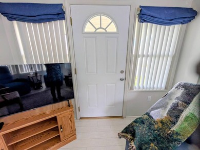 Move-in ready and fully furnished, this beautifully maintained on Grasslands Golf and Country Club in Florida - for sale on GolfHomes.com, golf home, golf lot