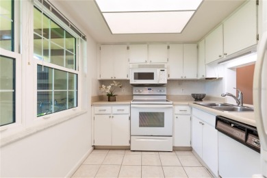 Ready to swap high-maintenance for high-enjoyment? This on The Dunedin Country Club in Florida - for sale on GolfHomes.com, golf home, golf lot