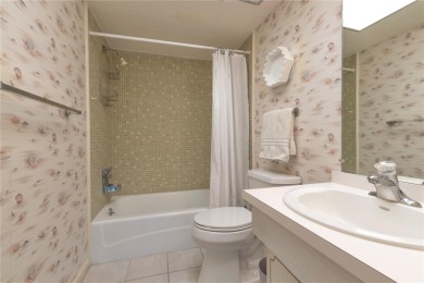 Ready to swap high-maintenance for high-enjoyment? This on The Dunedin Country Club in Florida - for sale on GolfHomes.com, golf home, golf lot