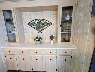 Move-in ready and fully furnished, this beautifully maintained on Grasslands Golf and Country Club in Florida - for sale on GolfHomes.com, golf home, golf lot