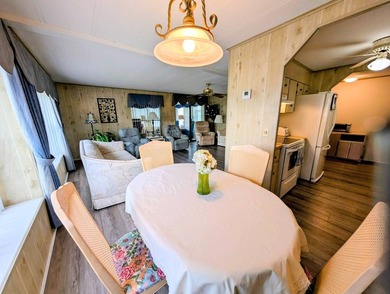 Move-in ready and fully furnished, this beautifully maintained on Grasslands Golf and Country Club in Florida - for sale on GolfHomes.com, golf home, golf lot