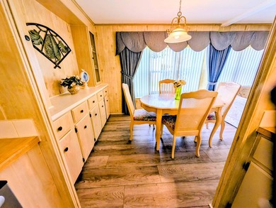 Move-in ready and fully furnished, this beautifully maintained on Grasslands Golf and Country Club in Florida - for sale on GolfHomes.com, golf home, golf lot