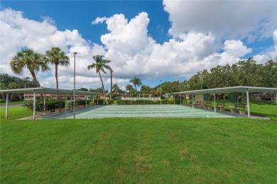 Ready to swap high-maintenance for high-enjoyment? This on The Dunedin Country Club in Florida - for sale on GolfHomes.com, golf home, golf lot