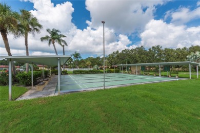 Ready to swap high-maintenance for high-enjoyment? This on The Dunedin Country Club in Florida - for sale on GolfHomes.com, golf home, golf lot